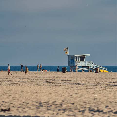 Be at the sandy beach within a 20-minute walk