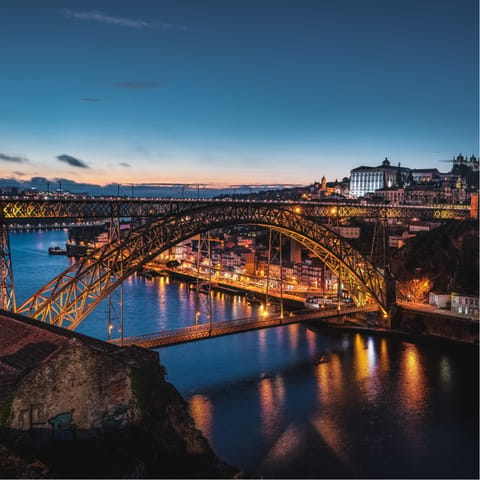 Take a romantic stroll along the River Douro after sunset