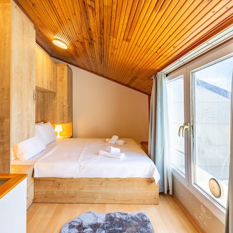 Feel both cosy and cool, open the doors in the bedroom out onto the balcony