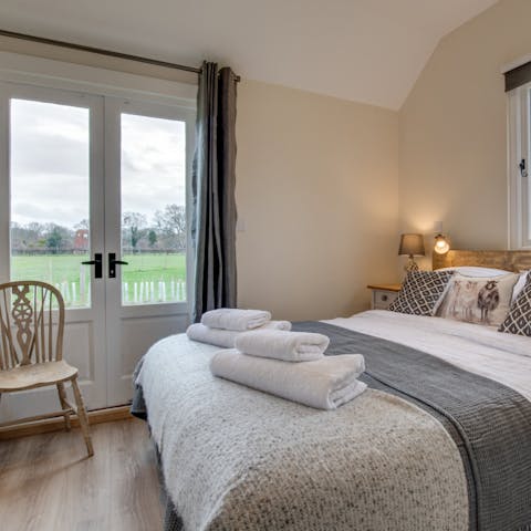 Wake up to blissful country views that look out onto green meadows all around 