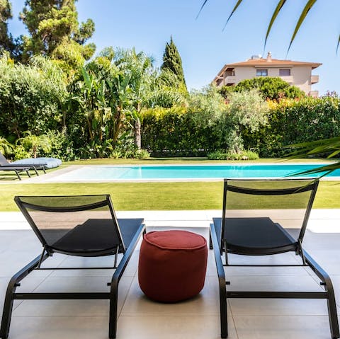 Savour a glass of Cava as you lounge by the pool