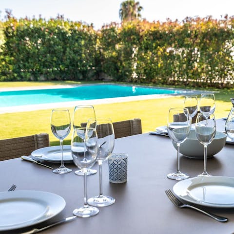 Hire a private chef to cook you a poolside meal