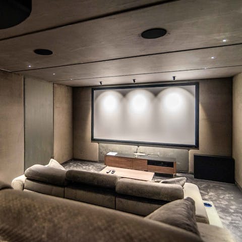 Come together for a movie night in the cinema room