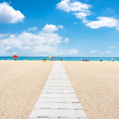 Put on your sunhat and take the 100 metre stroll to La Rubina beach