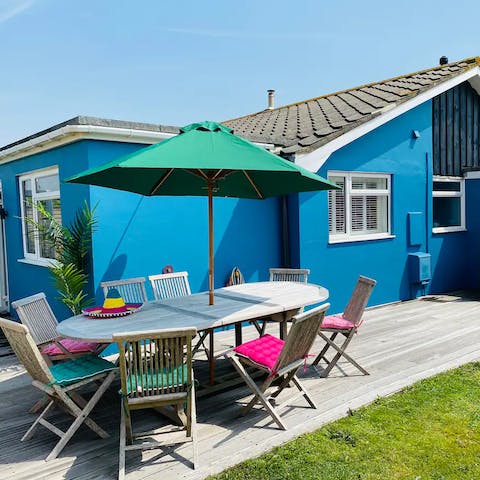 Share orange juice and snacks on the garden table
