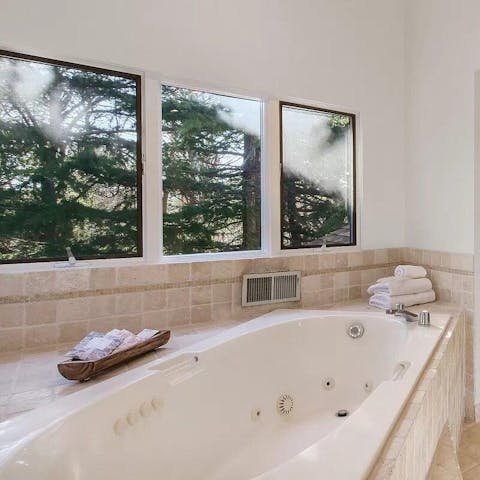 Experience total relaxation from the spa–like setting of the bathroom