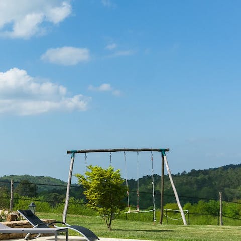 Keep the kids entertained with the vast lawns and playground swings 