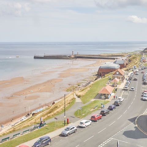 Stay on the beachfront and head down to the beach huts on foot