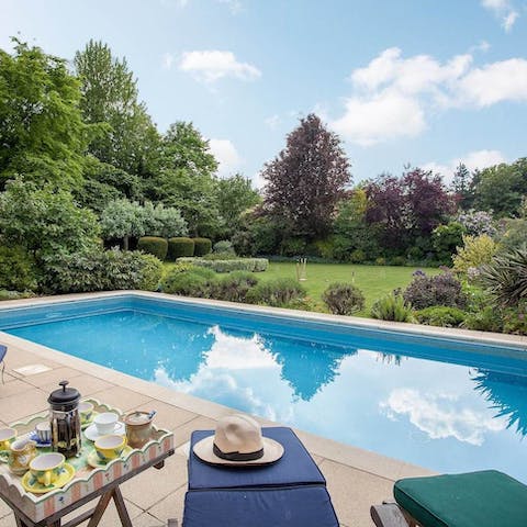 Jump into the heated swimming pool and look out over the walled garden