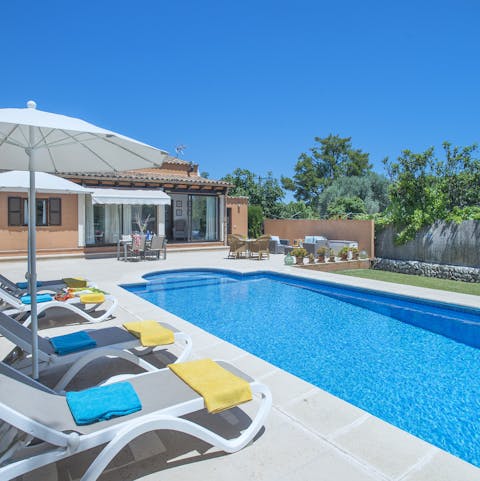 Laze on loungers in the sun before cooling off with a refreshing dip in your private pool