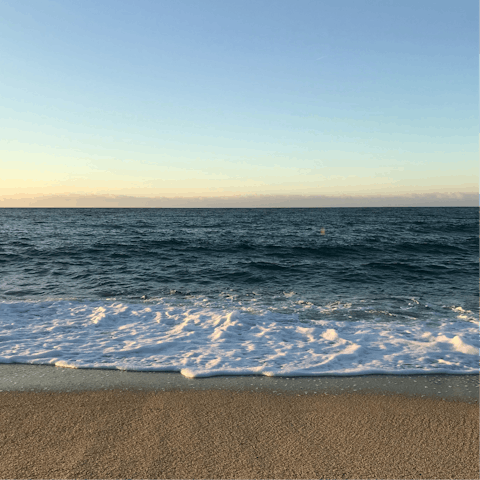 Stroll down to Ponente Beach and swim in the clear water