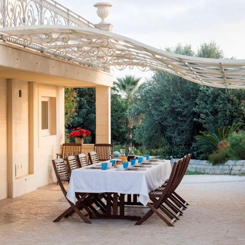 Dine on Sicilian delicacies in the warm sunshine