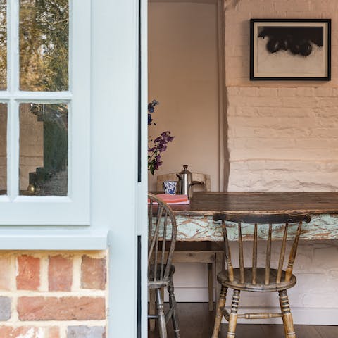 Share a meal and a bottle of wine around the vintage kitchen table
