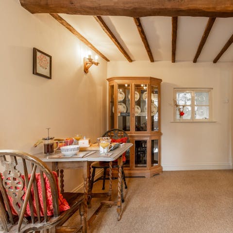 Share a romantic meal under the exposed beams