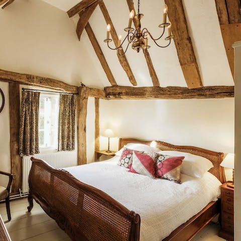 Wake up to wooden beams and village views each morning 