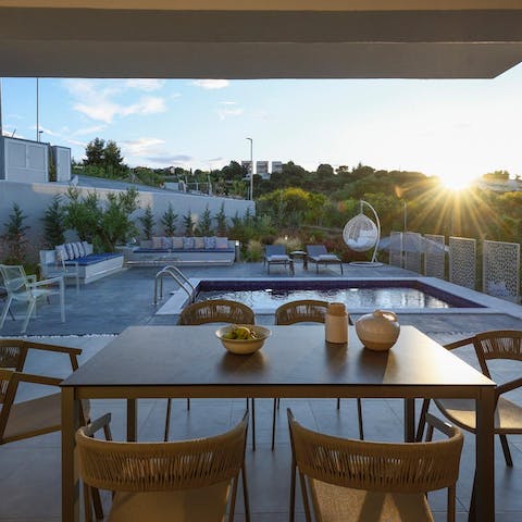 Enjoy a night  full of cocktails and home-cooked souvlaki on your terrace 
