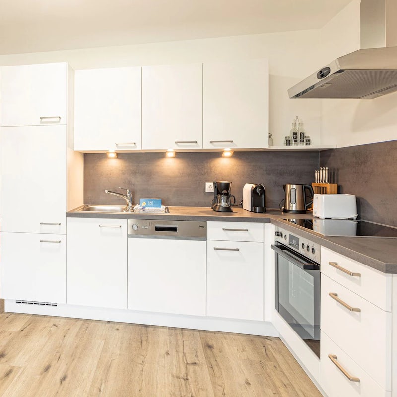 Prepare dinners for the family in your large sleek kitchen