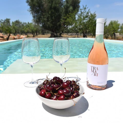Spend hours lazing by the pool with a glass of wine and local Ferovian cherries 