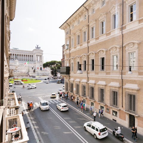 Enjoy a front-row seat to Roman life with this street-facing home