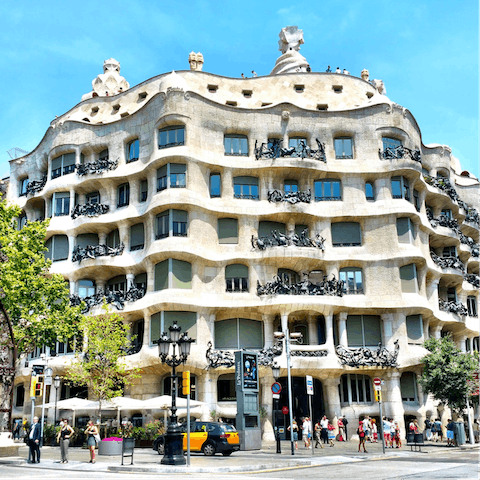 Discover Gaudí's extraordinary Casa Milà, just a fifteen-minute walk away
