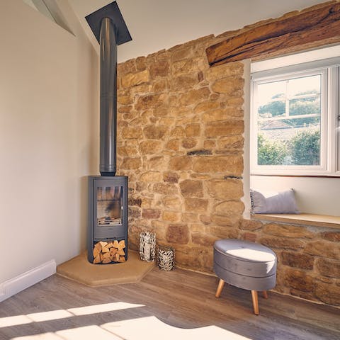 Make yourself at home in front of the wood-burning stove