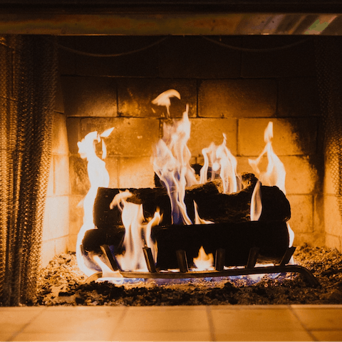 Spend cosy evenings snuggled up next to the fireplace