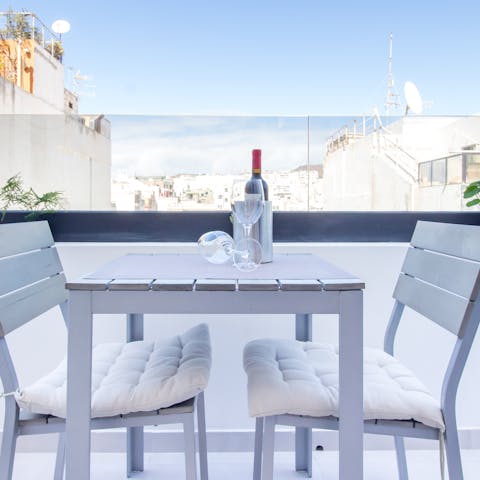 Enjoy an alfresco aperitif on the balcony