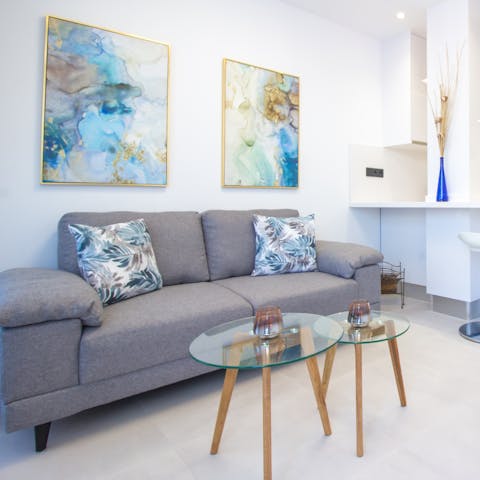 Stretch out in the living area after a day of exploring Gran Canaria