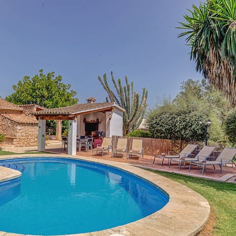 Relax on a sun lounger by the pool, and cool down with a quick dip