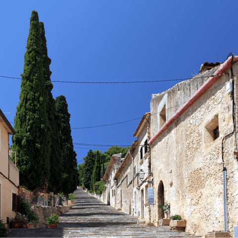 Explore the historic old town of Pollenca on foot