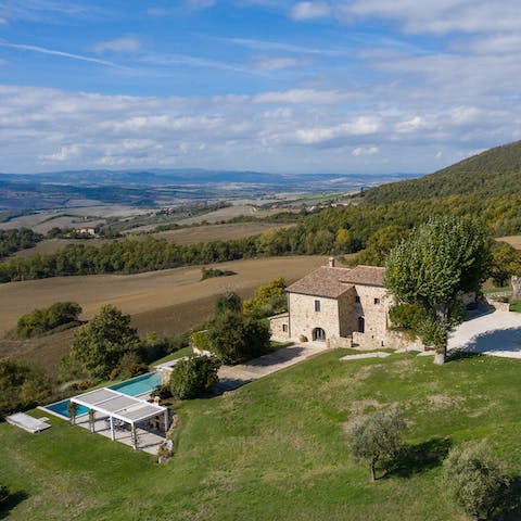 Stay on a Tuscan hillside and take in the glorious panorama around you