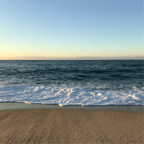 Soak up the golden sunshine on Playa del Muro, around a twenty-minute drive away