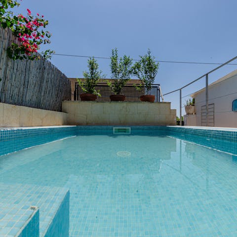 Spend balmy afternoons dipping in and out of the private pool