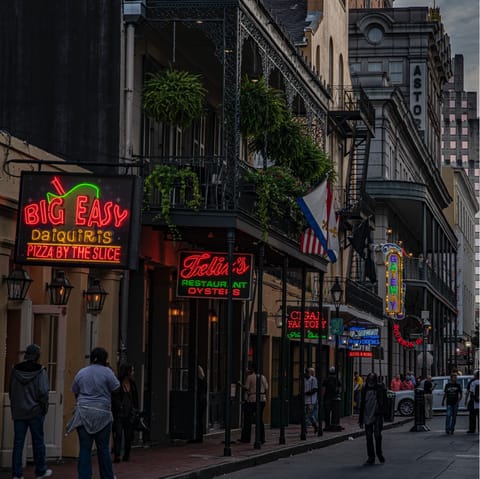 Follow the buzz of neon signs and live music to Bourbron Street, two minutes on foot