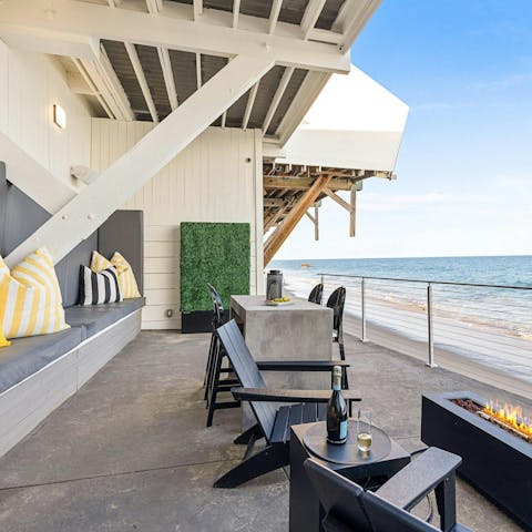 Take in the stunning views over Malibu Beach from the shared deck