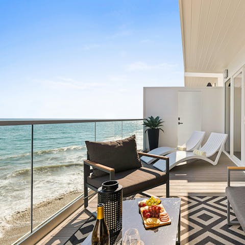 Listen to the sound of the Pacific Ocean from the private balcony
