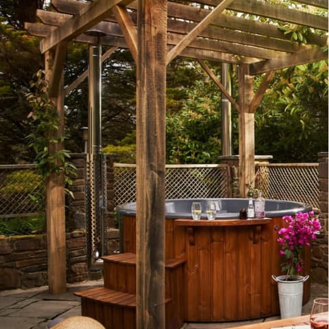 Take a long soak in your own wood-fired hot tub