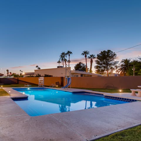 Spend sunny days frolicking in the backyard pool