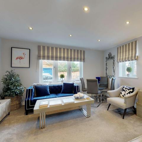 Drink, dine or simply chill out in the light-filled, open-plan living room