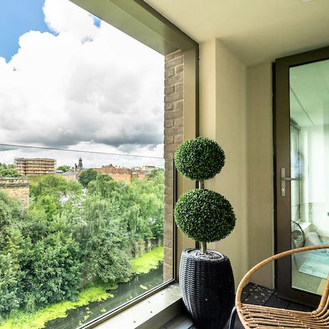 Watch river life unfold with your morning coffee on the balcony