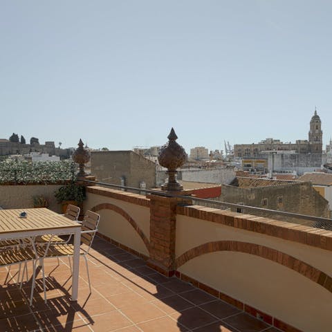 Soak up views of Alcazabar Castle and the cathedral from the rooftop terrace