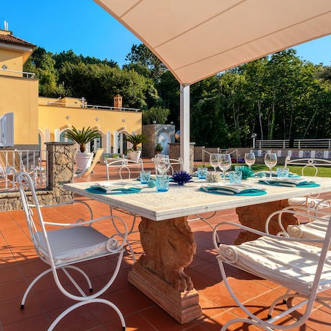 Enjoy alfresco feasts and Italian wine in the outdoor dining area 