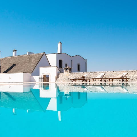 Swim laps in the huge pool, with a wall for privacy