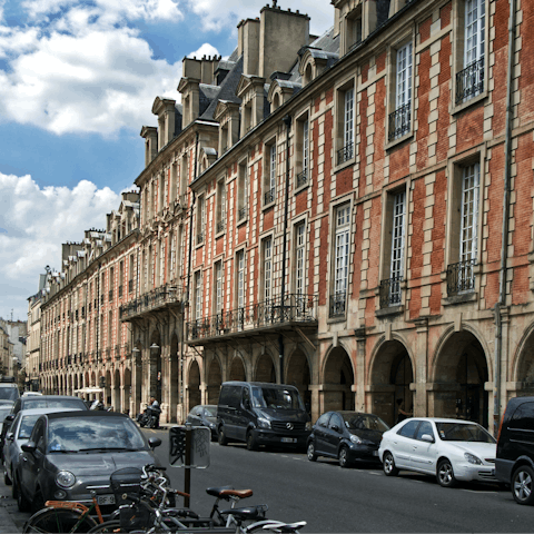 Grab a coffee and stroll to nearby Place des Vosges