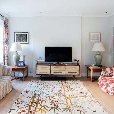 Make yourself at home in the vast en-suite master bedroom