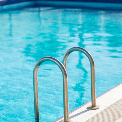 Make a splash in the communal swimming pool on sunny days