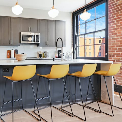 Start your day off in style with breakfast in the sleek kitchen and dining area
