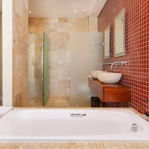 Run a bubble bath and relax in the sunken ensuite bath tubs