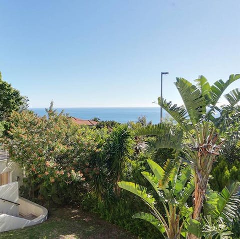 Soak up the view down to the sea from the wraparound balcony