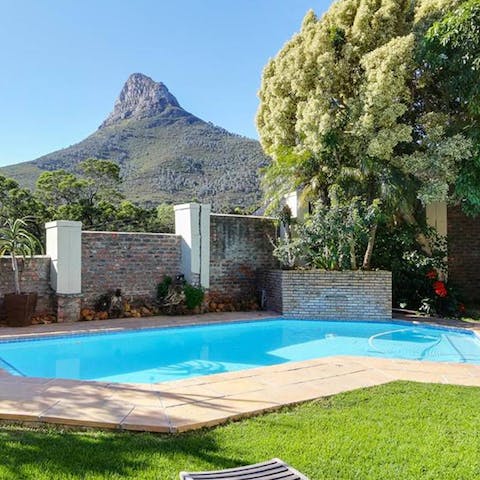 Swim lengths in the pool, surrounded by dramatic scenery
